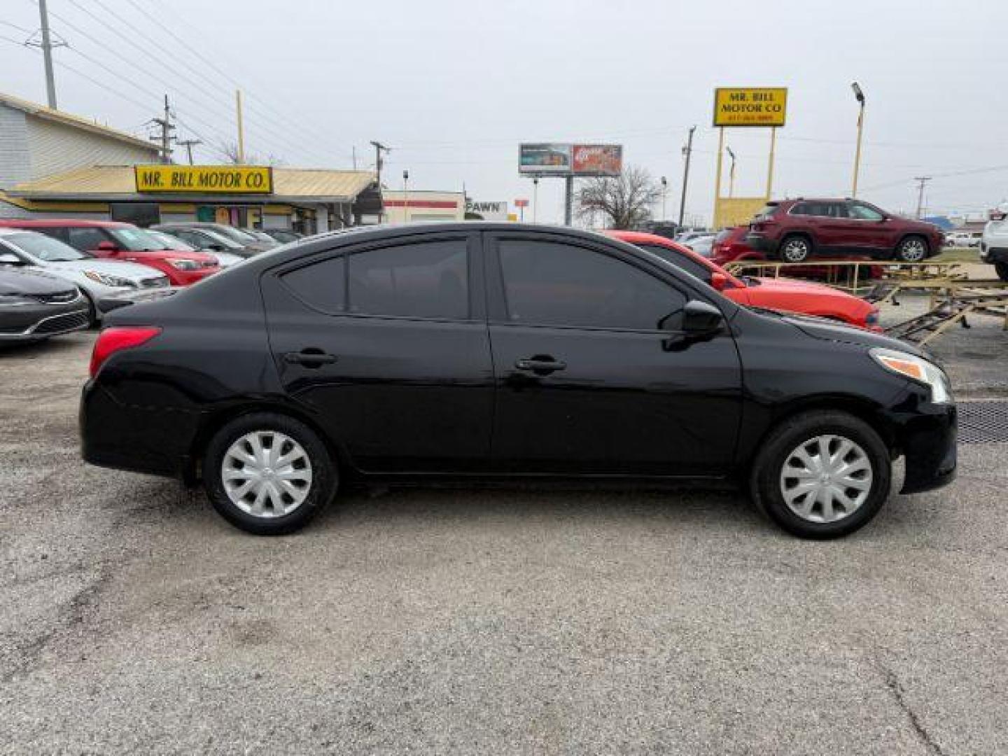 2017 BLACK Nissan Versa 1.6 S 4A (3N1CN7AP6HL) with an 1.6L L4 DOHC 16V engine, 4-Speed Automatic transmission, located at 2715 W Pioneer Pkwy, Arlington, TX, 76013, (817) 265-9009, 32.710262, -97.153236 - Photo#6