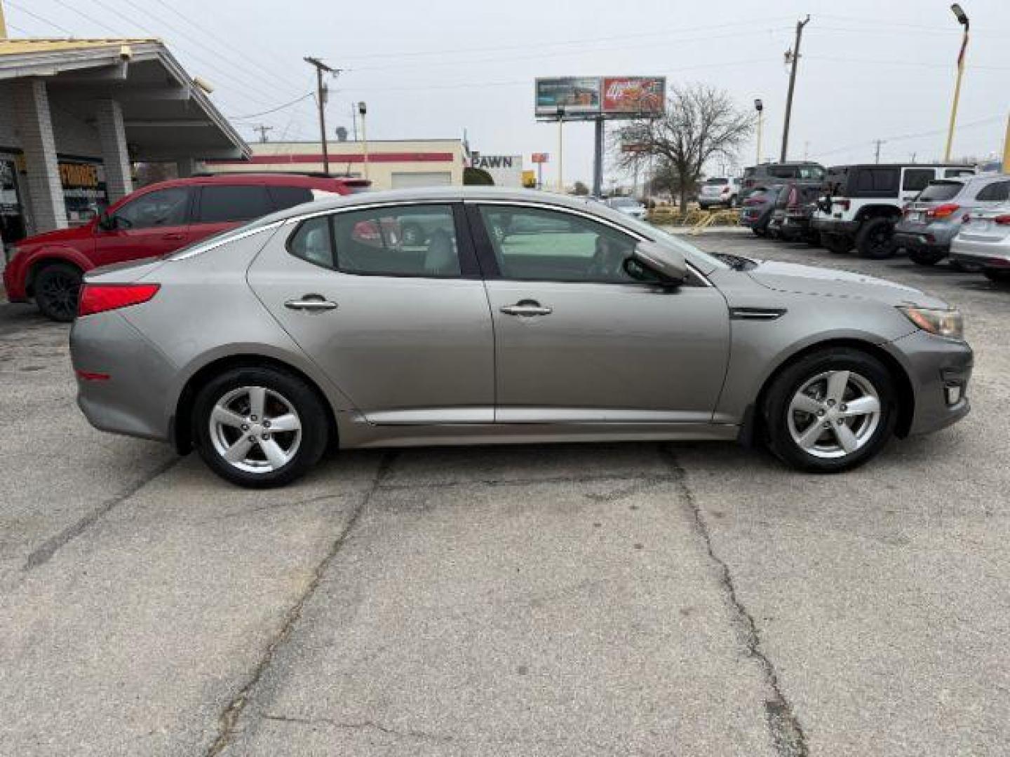 2015 GRAY Kia Optima LX (5XXGM4A71FG) with an 2.4L L4 DOHC 16V engine, 6-Speed Automatic transmission, located at 2715 W Pioneer Pkwy, Arlington, TX, 76013, (817) 265-9009, 32.710262, -97.153236 - Photo#6