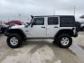 2012 SILVER Jeep Wrangler Unlimited Sahara 4WD (1C4BJWEG9CL) with an 3.6L V6 DOHC 24V FFV engine, located at 2715 W Pioneer Pkwy, Arlington, TX, 76013, (817) 265-9009, 32.710262, -97.153236 - Photo#2