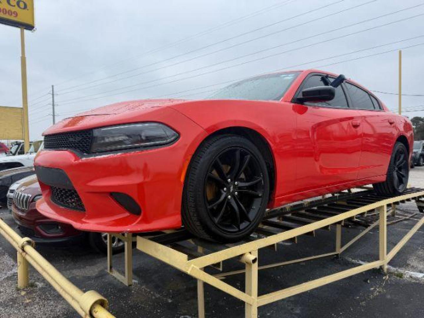 2018 ORANGE Dodge Charger SXT Plus (2C3CDXHG3JH) with an 3.6L V6 DOHC 24V engine, 8-Speed Automatic transmission, located at 2715 W Pioneer Pkwy, Arlington, TX, 76013, (817) 265-9009, 32.710262, -97.153236 - Photo#2